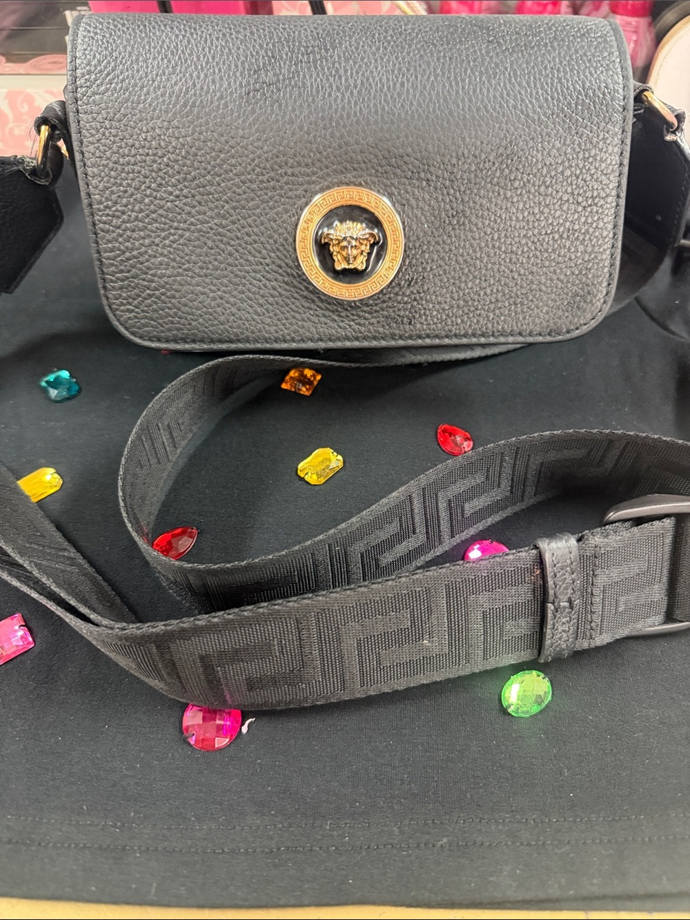 Black Leather Crossbody Bag with Gold Medallion Detail